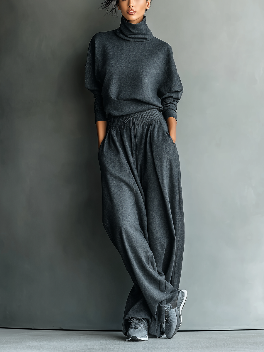 Set da donna in maglia di carbone con collo alto e pantaloni a gamba larga